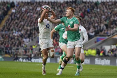 George Furbank of England competes for a bouncing ball with Ciaran Frawley of Ireland, George Furbank was adjudged to have knocked on during the 2024 Guinness 6 Nations match England vs Ireland at Twickenham Stadium, Twickenham, United Kingdom, 9th M clipart