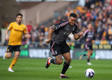 Rodrigo Muniz of Fulham breaks forward with the ball, during the Premier League match Wolverhampton Wanderers vs Fulham at Molineux, Wolverhampton, United Kingdom, 9th March 202 clipart