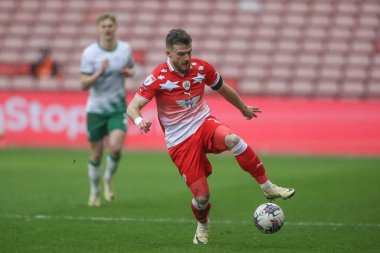 Barnsley 'den Nicky Cadden 9 Mart 202' de Oakwell, Barnsley, İngiltere 'de oynanan Sky Bet 1 maçında topu kontrol ediyor.