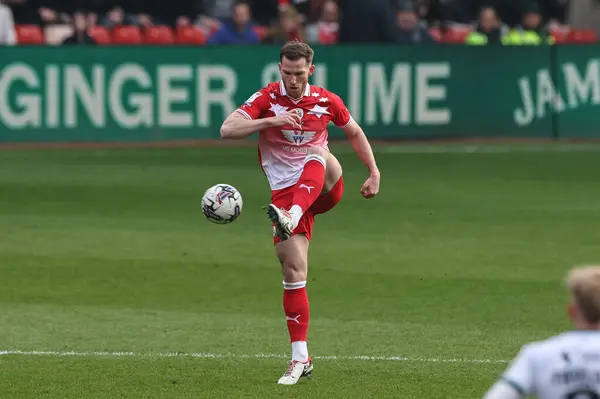 stock image Jamie McCart of Barnsley with the ball during the Sky Bet League 1 match Barnsley vs Lincoln City at Oakwell, Barnsley, United Kingdom, 9th March 202