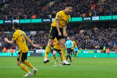 Wolverhampton Wanderers takımından Joo Gomes, 9 Mart 2024 'te Wolverhampton Wanderers ile Fulham arasında oynanan Premier League maçında 2-0' lık galibiyet golünü kutluyor.