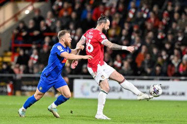 Steven Fletcher of Wrexham brings the ball under control, during the Sky Bet League 2 match Wrexham vs Harrogate Town at SToK Cae Ras, Wrexham, United Kingdom, 12th March 202 clipart