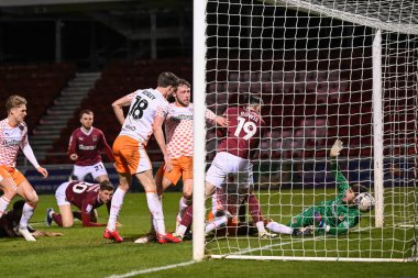 Blackpool 'dan Matthew Pennington, Sky Bet League 1 maçında Northampton Town' a karşı Blackpool maçında İngiltere 'nin Sixfields Stadyumu, Northampton' da 12 Mart 202 'de 0-1 berabere kaldı.