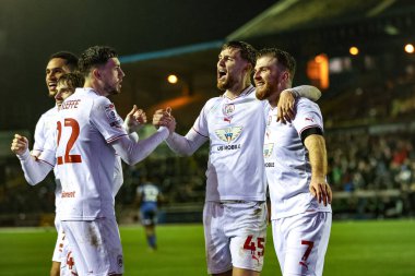 Barnsley 'den John Mcatee, 12 Mart 202' de İngiltere 'nin Carlisle Park kentinde oynanan Sky Bet Lig 1 karşılaşmasında golünü 1-2 atmasını kutluyor.