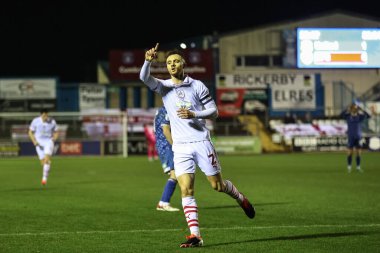 Barnsley 'den Jordan Williams, 12 Mart 202' de İngiltere 'nin Carlisle kenti Brunton Park' ta oynanan Sky Bet Lig 1 karşılaşmasında golünü 1-1 atmasını kutluyor.