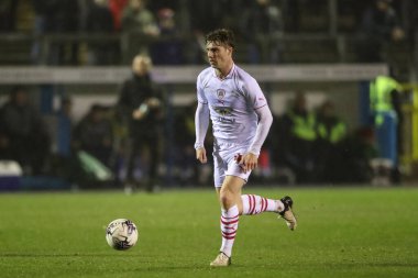 Barnsley 'den Luca Connell, 12 Mart 202' de İngiltere 'nin Brunton Park kentinde oynanan Sky Bet 1 karşılaşmasında topu sürüyor.