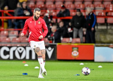 Ollie Palmer of Wrexham warms up ahead of the match, during the Sky Bet League 2 match Wrexham vs Harrogate Town at SToK Cae Ras, Wrexham, United Kingdom, 12th March 202 clipart