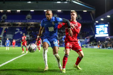 Birmingham City 'den Emanuel Aiwu, Birmingham City' nin 12 Mart 202 'de St Andrews, Birmingham' da oynadığı Sky Bet Şampiyonası karşılaşmasında Middlesbrough 'dan Marcus Forss' u durdurdu.