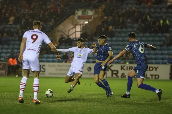 stock image John Mcatee of Barnsley shoots on goal during the Sky Bet League 1 match Carlisle United vs Barnsley at Brunton Park, Carlisle, United Kingdom, 12th March 202