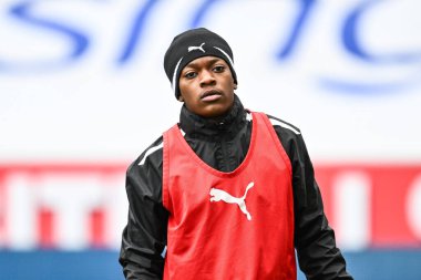 Karamoko Dembele of Blackpool during the pre-game warmup during the Sky Bet League 1 match Wigan Athletic vs Blackpool at DW Stadium, Wigan, United Kingdom, 16th March 202 clipart