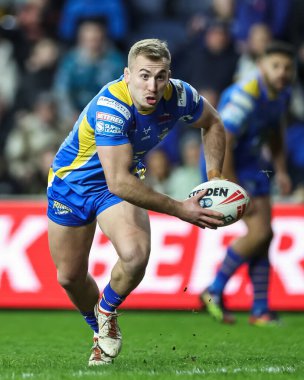 Leeds Rhinos 'tan Jarrod OConnor, 15 Mart 2024' te Leeds Stadyumu 'nda oynanan Betfred Süper Lig 5. Raundunda Leeds Gergedan' a karşı St Helens maçında ilk hamlesini yaptı.