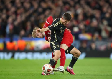 Liverpool 'dan Harvey Elliott ve Sparta Praha Atletizm Kulübü' nden Luk Sadlek, Anfield, Liverpool, İngiltere 'de 14 Mart 2024' te oynanan UEFA Avrupa Ligi karşılaşmasında Liverpool ve Sparta Prag 'a karşı mücadele etti.