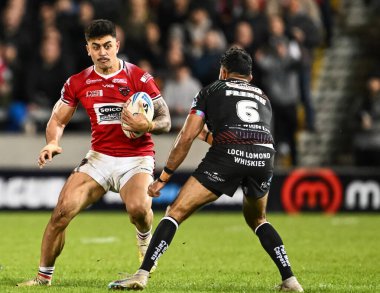 Salford Red Devils takımından Tim Lafai, Salford Community Stadyumu 'nda oynanan Salford Red Devils - Wigan Warriors maçında 14 Mart 202' de ilk raundu kazandı.