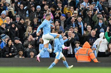 Manchester City 'den Bernardo Silva, 16 Mart 202 tarihinde Etihad Stadyumu' nda oynanan ve Manchester City 'nin Newcastle United' a karşı oynadığı final karşılaşmasında Manchester City 'nin 1-0 kazanmasını kutluyor.