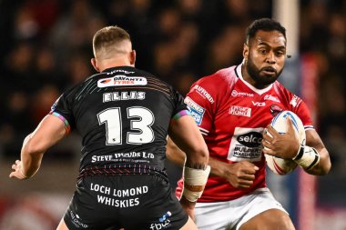 Salford Red Devils 'den Kral Vuniyayawa, Salford Community Stadyumu' nda oynanan 5. Salford Red Devils - Wigan Warriors maçında maç yapıyor.
