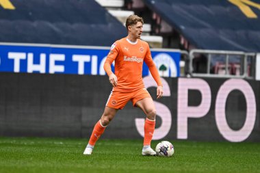 Blackpool takımından George Byers, Wigan Athletic 'in Blackpool' a karşı 16 Mart 202 'de oynadığı Wigan Stadyumu' nda oynanan 1.