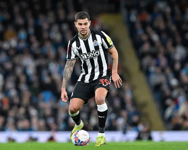 Stock image Bruno Guimares of Newcastle United in action, during the Emirates FA Cup Quarter- Final match Manchester City vs Newcastle United at Etihad Stadium, Manchester, United Kingdom, 16th March 2024