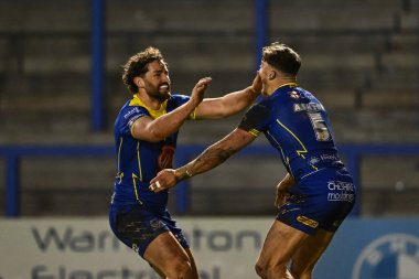 Warrington Wolves 'tan Matty Ashton, 23 Mart 202' de Warrington, İngiltere 'deki Halliwell Jones Stadyumu' nda oynanan 6. tur Betfred Challenge Kupası karşılaşmasında şansını kutluyor.
