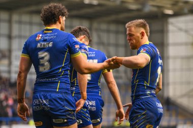 Warrington Wolves 'un Toby King' i, 23 Mart 202 'de Warrington, İngiltere' deki Halliwell Jones Stadyumu 'nda oynanan Warrington Wolves - London Broncos maçında, Betfred Challenge Kupası 6. raundunda denemesini kutluyor.