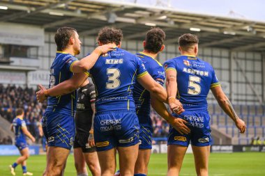Warrington Wolves 'un Toby King' i, 23 Mart 202 'de Warrington, İngiltere' deki Halliwell Jones Stadyumu 'nda oynanan Warrington Wolves - London Broncos maçında, Betfred Challenge Kupası 6. raundunda denemesini kutluyor.