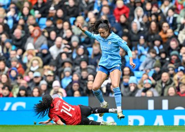 Jayde Riviere of Manchester United Women tackles Leila Ouahabi of Manchester City Women, during the The FA Women's Super League match Manchester City Women vs Manchester United Women at Etihad Stadium, Manchester, United Kingdom, 23rd March 202 clipart