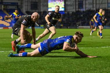 Warrington Wolves takımından Matty Nicholson, 23 Mart 202 'de İngiltere' nin Warrington kentinde oynanan ve Warrington Jones Stadyumu 'nda oynanan Warrington Wolves' un Londra Broncos 'a karşı oynadığı Betfred Challenge Kupası Altıncı Raundu karşılaşmasında şansını deniyor.