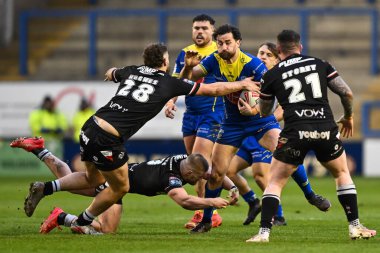 Warrington Wolves 'tan Toby King, Londra Broncos' tan Jarred Bassett ve Londra Broncos 'tan Jack Hughes tarafından oynanan Betfred Challenge Cup Altıncı Raundda Warrington Wolves, Londra Broncos' a karşı Halliwell Jones Stadyumu, Warrington, United King