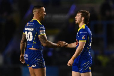 Paul Vaughan of Warrington Wolves and Adam Holroyd of Warrington Wolves shake hands at the end of the the Betfred Challenge Cup Sixth Round match Warrington Wolves vs London Broncos at Halliwell Jones Stadium, Warrington, United Kingdom, 23rd March 2 clipart