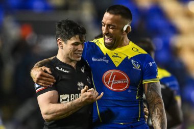 Warrington Wolves 'tan Paul Vaughan ve Londra Broncos' tan Dean Parata, 23 Mart 202 'de Warrington, İngiltere' deki Halliwell Jones Stadyumu 'nda oynanan Betfred Challenge Cup Altıncı Raundu karşılaşmasında bir fıkra paylaştı.