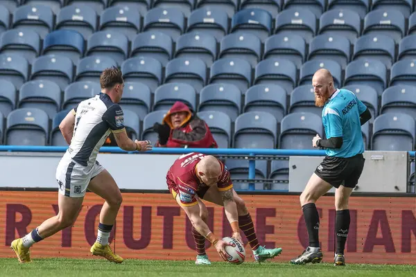 stock image Adam Swift of Huddersfield Giants goes over for a try to make it 22-6 during the Betfred Challenge Cup Sixth Round match Huddersfield Giants vs Hull FC at John Smith's Stadium, Huddersfield, United Kingdom, 23rd March 202