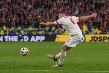 Polonyalı Jakub Piotrowski, 26 Mart 202 'de Cardiff City Stadyumu' nda oynanan Galler-Polonya maçında UEFA Euro Eleme Grubu eleme maçında gol attı.