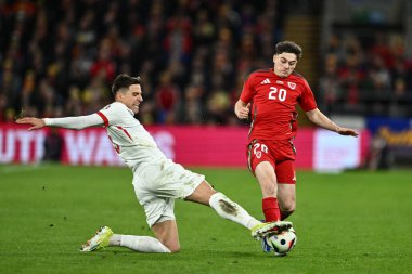 Polonyalı Jan Bednarekt, UEFA Euro Elemeleri Eleme Grubu A karşılaşmasında Galler 'e karşı Polonya' nın Cardiff City Stadyumu, İngiltere 'de 26 Mart 202' de oynanan karşılaşmasında Galli Daniel James 'i mağlup etti.