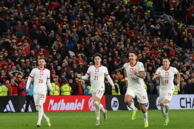Polonya, 26 Mart 202 'de Cardiff City Stadyumu' nda Galler 'e karşı Galler Avrupa Kalifiye Grubu A karşılaşmasında Galler' e karşı kazandığı penaltı zaferini kutladı.
