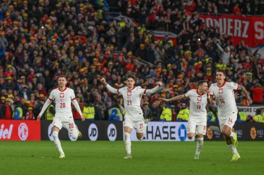 Polonya, 26 Mart 202 'de Cardiff City Stadyumu' nda Galler 'e karşı Galler Avrupa Kalifiye Grubu A karşılaşmasında Galler' e karşı kazandığı penaltı zaferini kutladı.