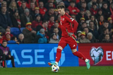 Galler 'den Joe Rodon, 26 Mart 202' de Cardiff City Stadyumu 'nda oynanan Galler - Polonya maçında UEFA Euro Elemeleri eleme Grubu A maçında topa vuruyor.