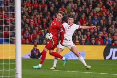 Galler 'den Joe Rodon ve Polonya' dan Jakub Piotrowski, UEFA Euro Eleme Grubu A karşılaşmasında Cardiff City Stadyumu, Cardiff, Birleşik Krallık, 26 Mart 202 'de Galler ile Polonya karşılaşacak.