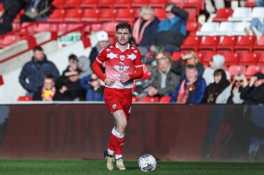 Barnsley 'den Luca Connell, 29 Mart 202' de İngiltere 'nin Oakwell kentinde oynanan ve Cambridge United' a karşı oynanan Sky Bet 1 maçında topu aldı.