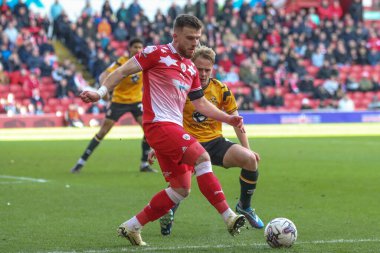 Barnsley 'den Nicky Cadden, 29 Mart 202' de Oakwell, Barnsley, Birleşik Krallık 'ta oynanan Sky Bet 1 maçında pas veriyor.