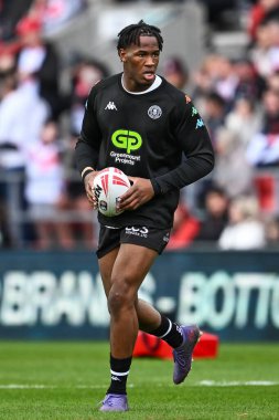 Wigan Warriors takımının Junior Nsemba 'sı Betfred Süper Lig 6. raundu öncesinde ısınma turunda St Helens Wigan Warriors' a karşı Wicked Stadyumu, St Helens, Birleşik Krallık, 29 Mart 202