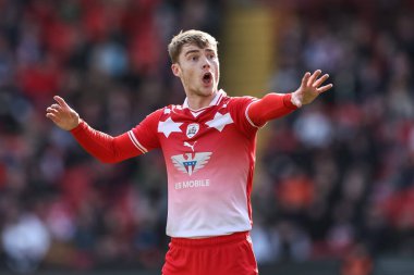 Luca Connell of Barnsley gives his team instructions during the Sky Bet League 1 match Barnsley vs Cambridge United at Oakwell, Barnsley, United Kingdom, 29th March 202 clipart