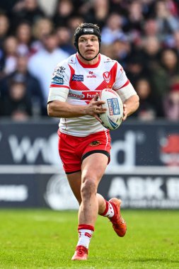 Jonny Lomax of St. Helens makes a break during the Betfred Super League Round 6 match St Helens vs Wigan Warriors at Totally Wicked Stadium, St Helens, United Kingdom, 29th March 202 clipart