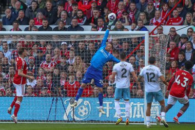 Nottingham Ormanı 'ndan Matz Sels, İngiltere' nin Nottingham şehrinde 30 Mart 202 'de oynanan Premier Lig maçı sırasında Nottingham Forest' a karşı Crystal Palace maçında parmak ucuyla kurtarıyor.