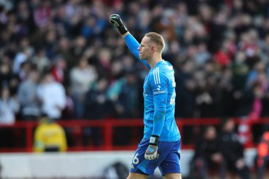 Nottingham Ormanı 'ndan Matz Sels 30 Mart 202' de İngiltere 'nin Nottingham City Ground kentinde oynanan Premier League maçında takımının 1-1' lik galibiyet golünü kutluyor.