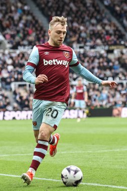 Jarrod Bowen of West Ham United with the ball during the Premier League match Newcastle United vs West Ham United at St. James's Park, Newcastle, United Kingdom, 30th March 202 clipart