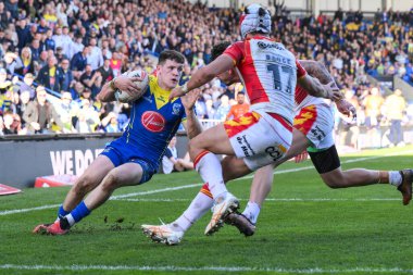 Warrington Wolves 'tan Josh Thewlis, 30 Mart 202' de İngiltere 'nin Warrington kentinde oynanan Betfred Süper Lig karşılaşmasında Warrington Wolves, Catalans Dragons' a karşı oynuyor.