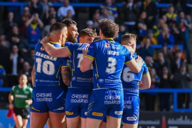Warrington Wolves takımından Zane Musgrove, 30 Mart 202 'de İngiltere' nin Warrington şehrinde oynanan Betfred Süper Lig karşılaşmasında Warrington Wolves ve Catalans Dragons maçını kutluyor.