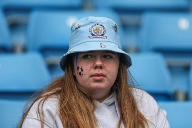 taraftarlar Premier Lig karşılaşması öncesinde Manchester City ile Arsenal arasında 31 Mart 202 'de Etihad Stadyumu' na geldiler.