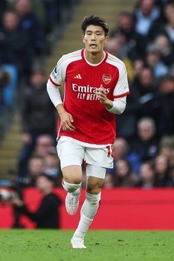 Premier Lig karşılaşmasında Arsenal 'den Takehiro Tomiyasu Manchester City, Manchester Stadyumu' nda Arsenal 'e karşı 31 Mart 202