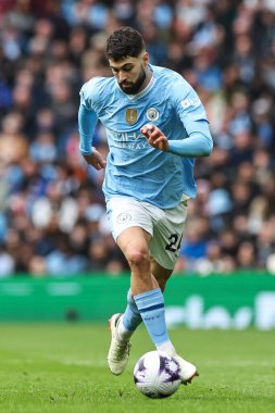 Manchester City 'den Joko Gvardiol, Premier League maçında Manchester City ile Arsenal arasında 31 Mart 2024' te Etihad Stadyumu 'nda bir ara verdi.