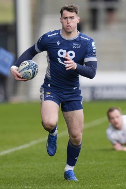 Tom Roebuck of Sale Sharks runs with the ball during the Gallagher Premiership match Sale Sharks vs Exeter Chiefs at Salford Community Stadium, Eccles, United Kingdom, 31st March 202 clipart